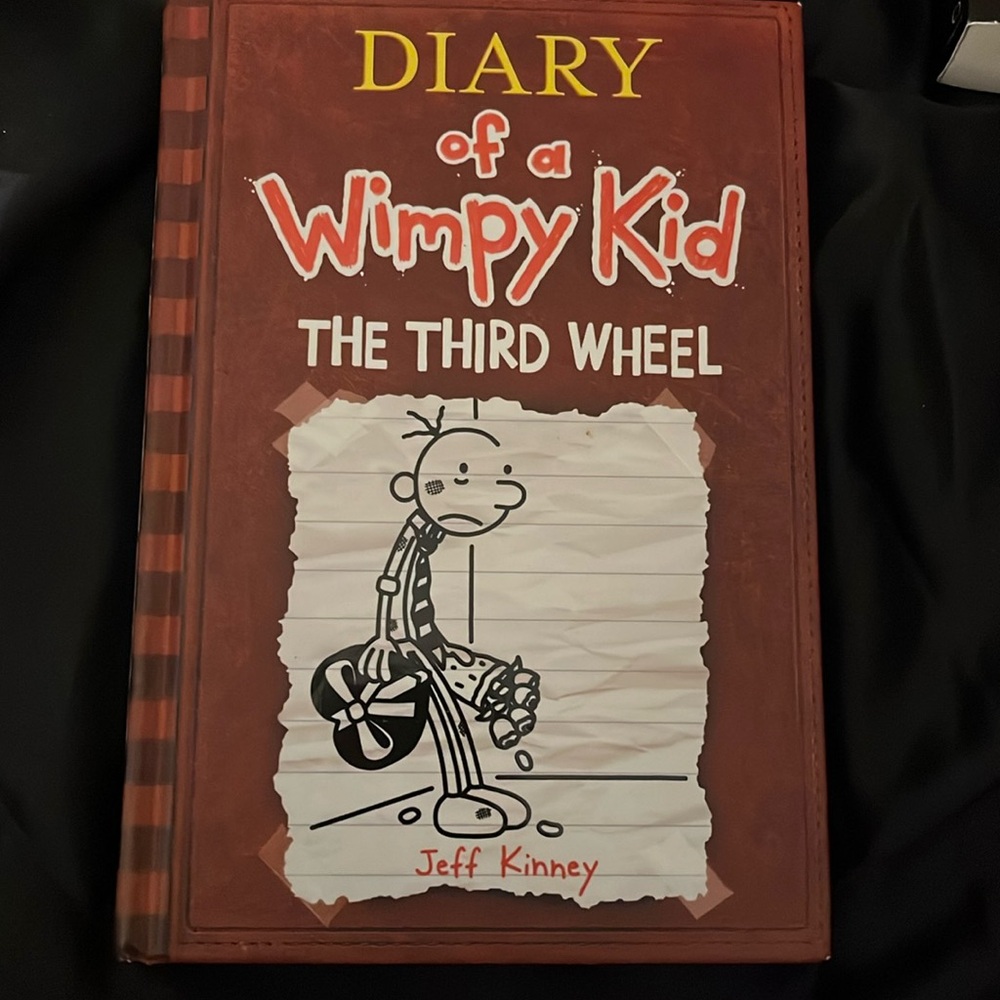 Diary of a Wimpy kid the third wheel book 7 by Jeff Kinney